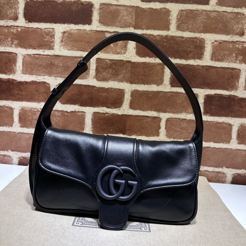 G*u*i top handle bags